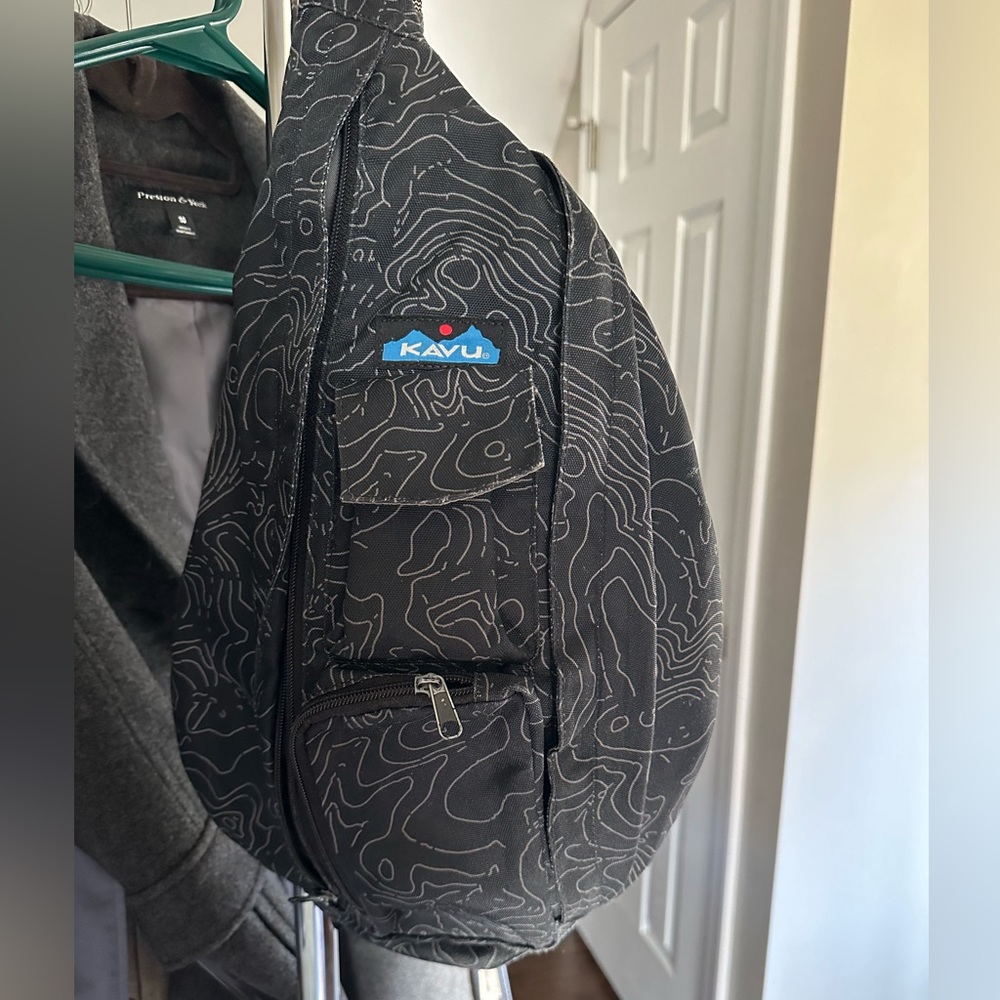 Kavu sling bag, black topo map design, good condition
